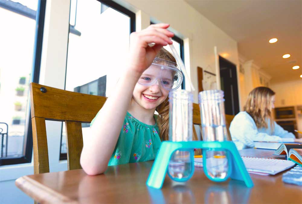 Hero Image for Utah, young girl conducting science experiment with Connections Academy Utah